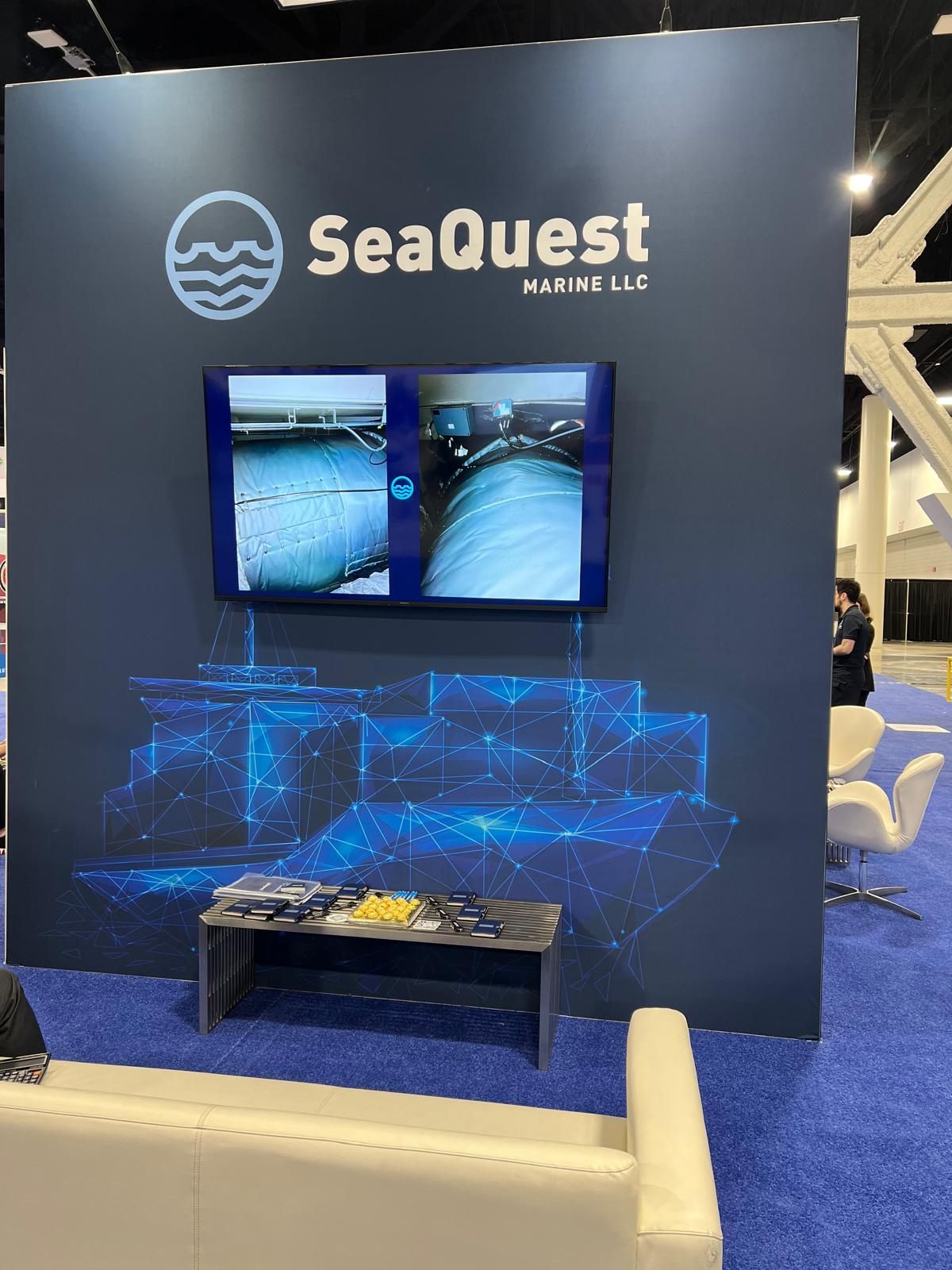SeaQuest exhibition booth with display screens
